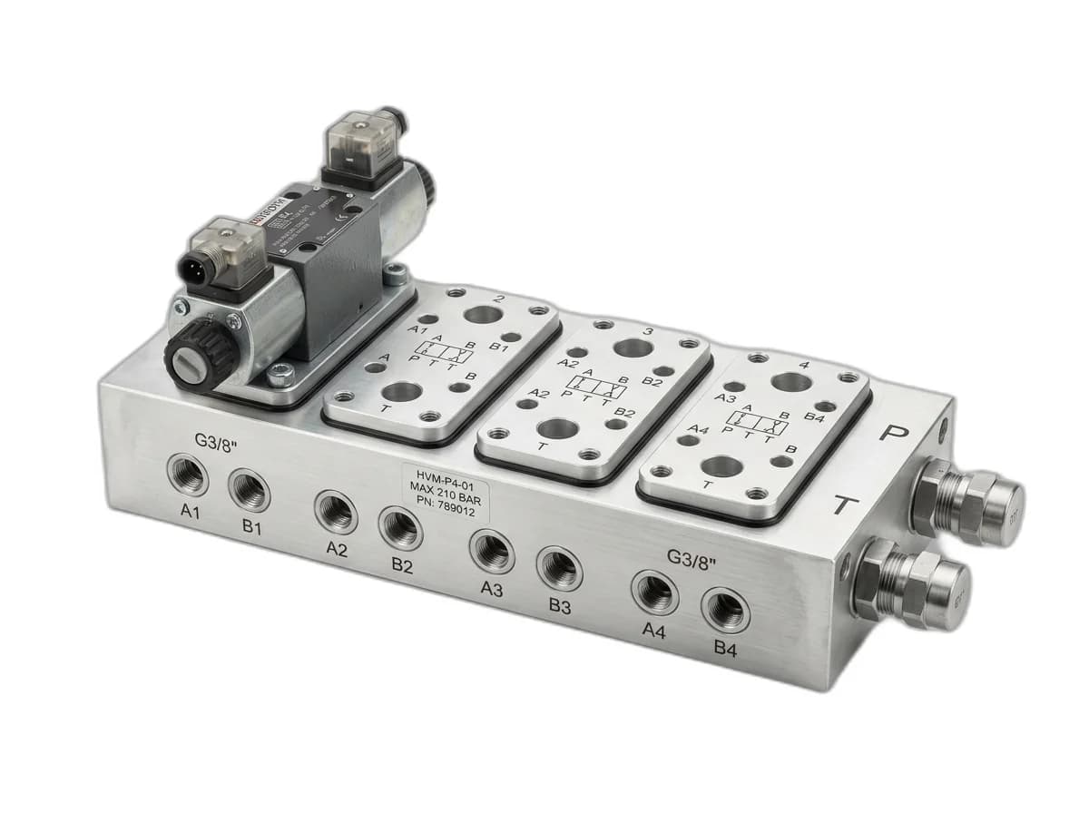 Multi-station 4-valve parallel hydraulic manifold block machined from aircraft-grade aluminum/steel